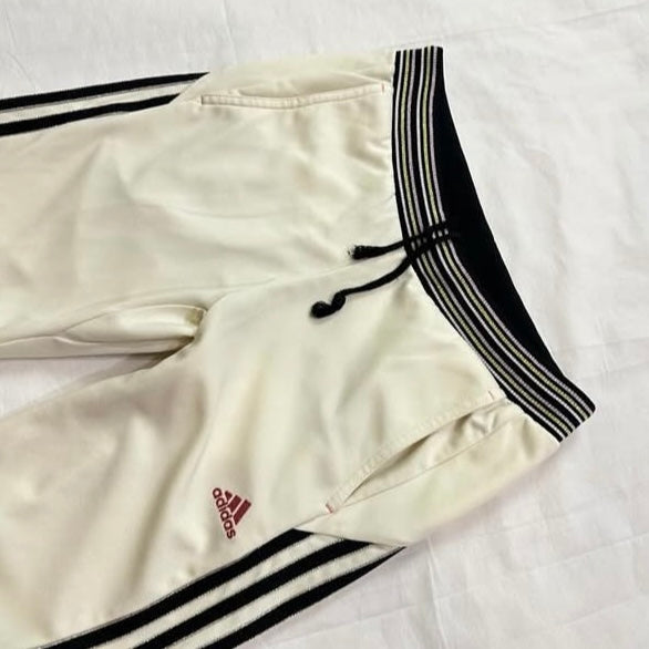 Adidas beige track pants with pink logo