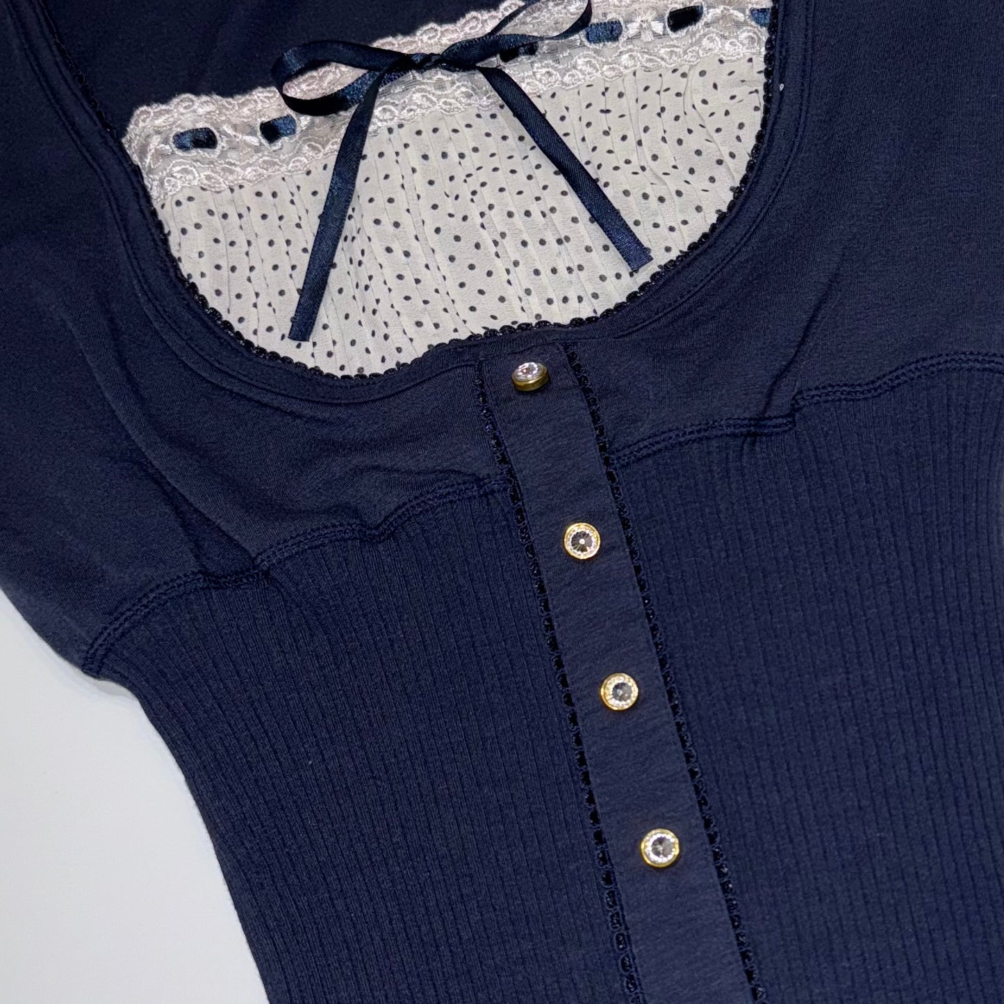 Navy polka dot layered top