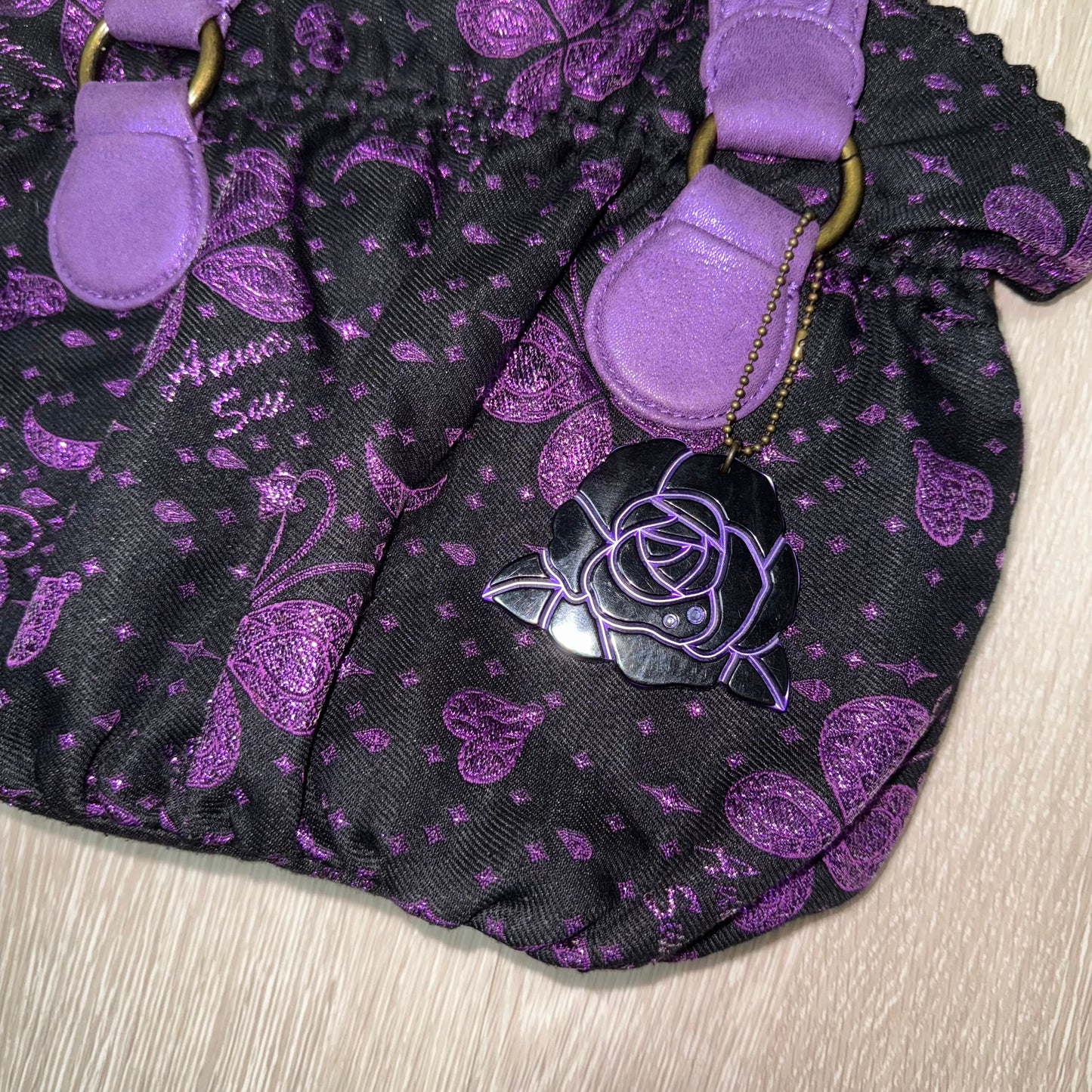 Anna Sui Purple butterfly shoulder bag with rose charm