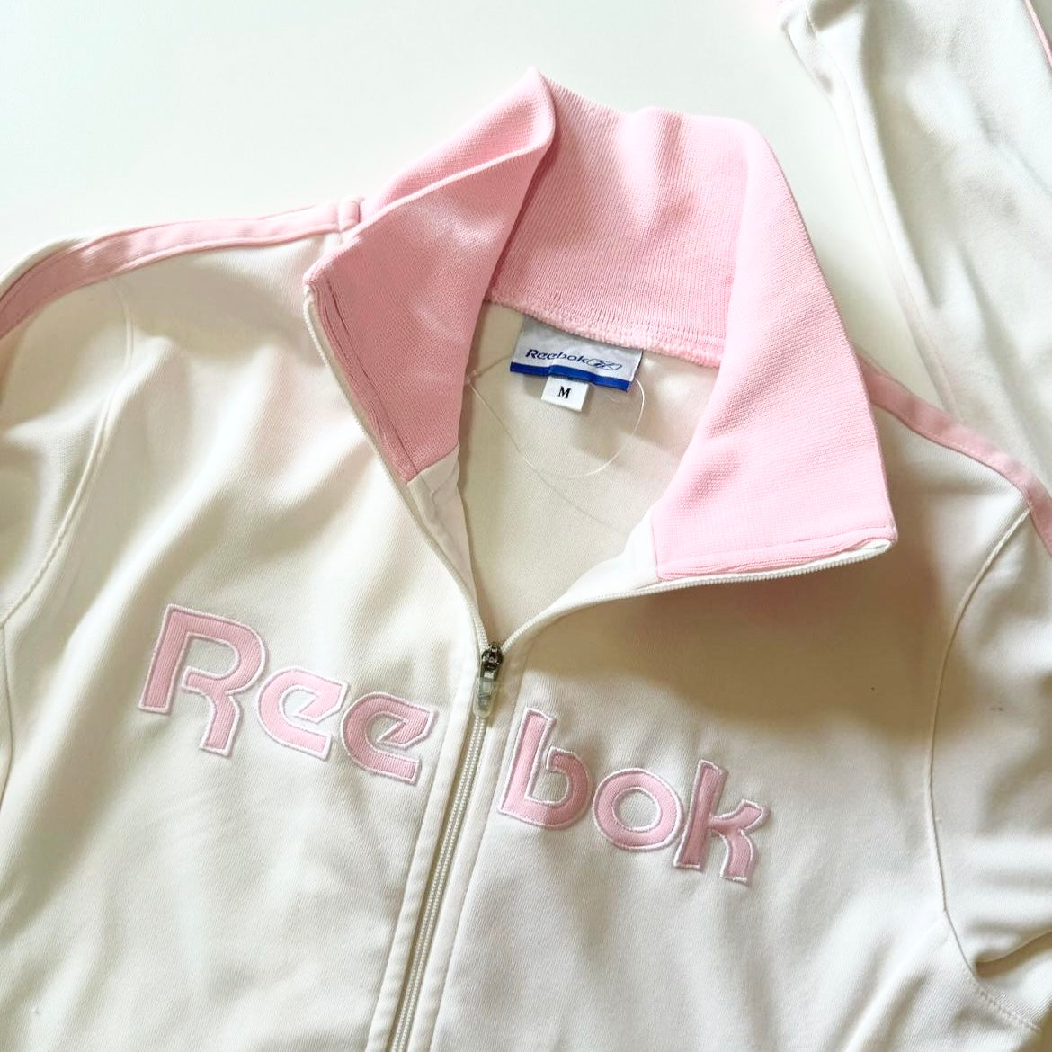 Reebok pink and white jacket
