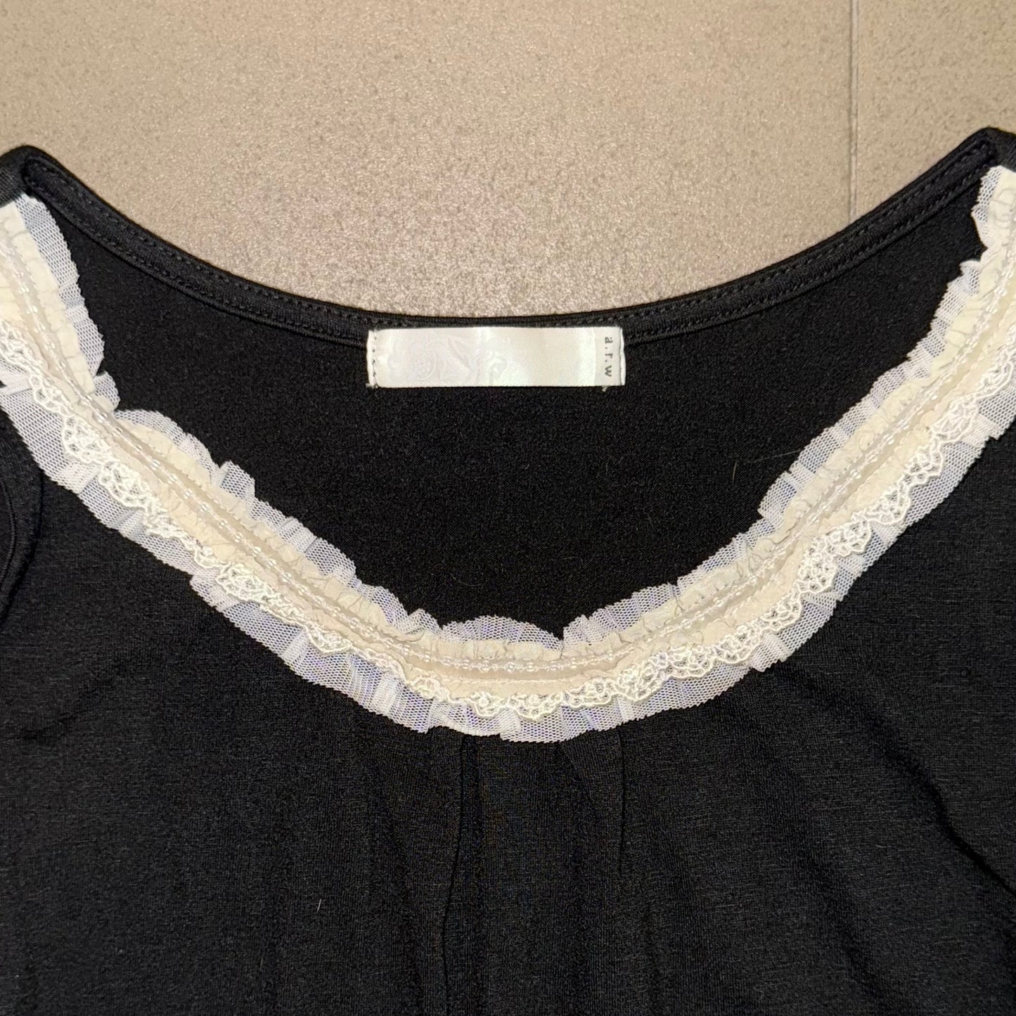 Arw black top with beaded collar