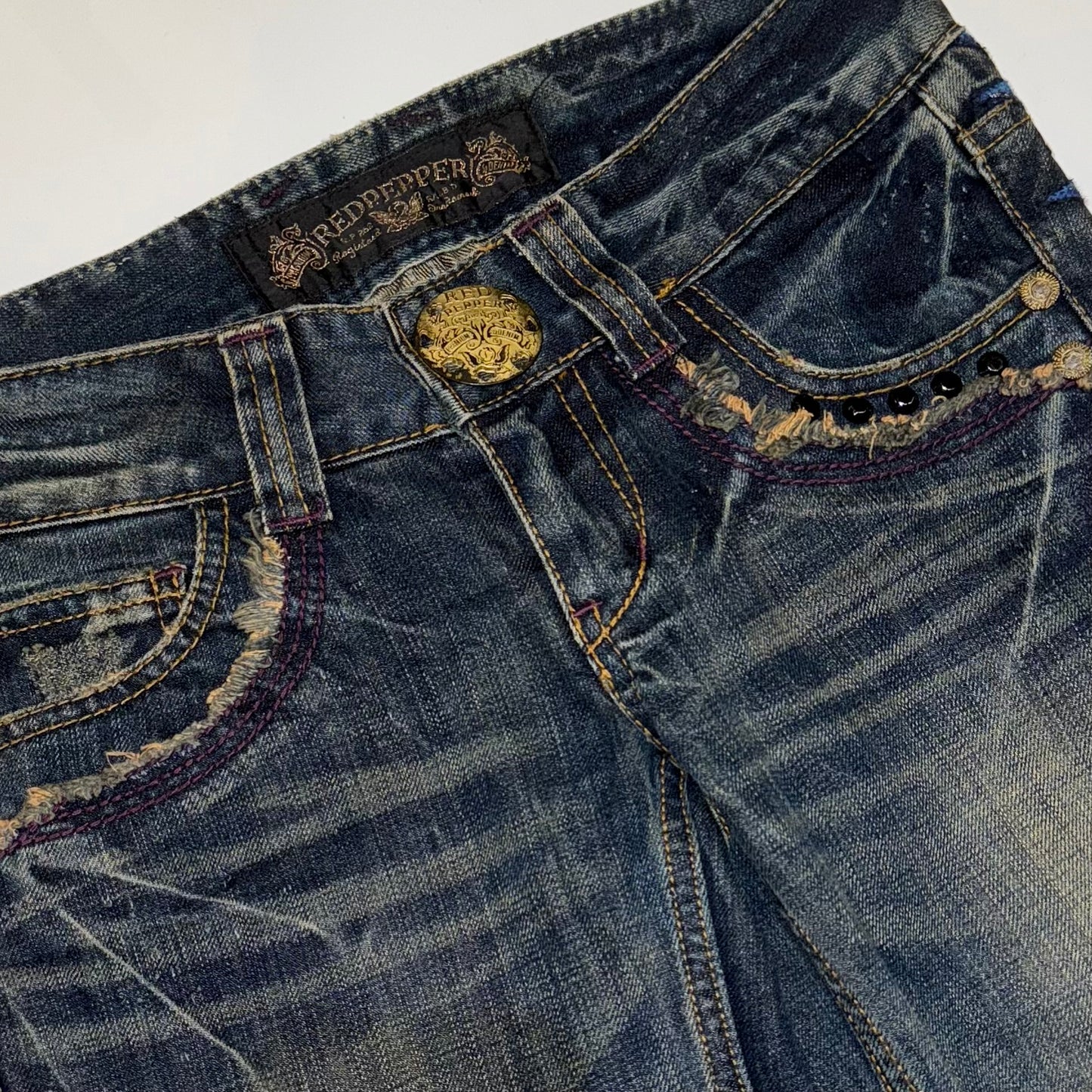 Red Pepper rivets embroidered wings low rise bootcut jeans