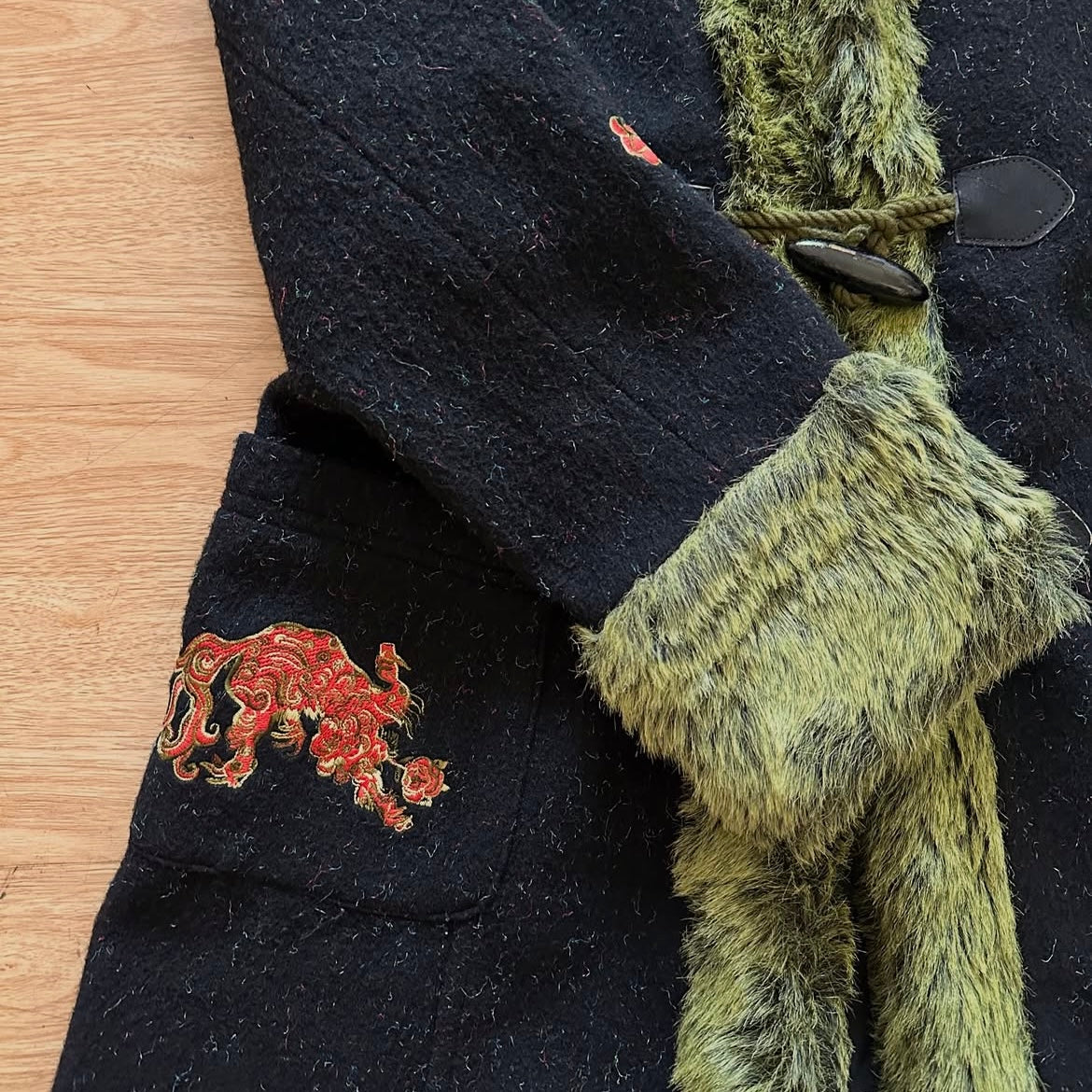 Betty’s blue dragon coat