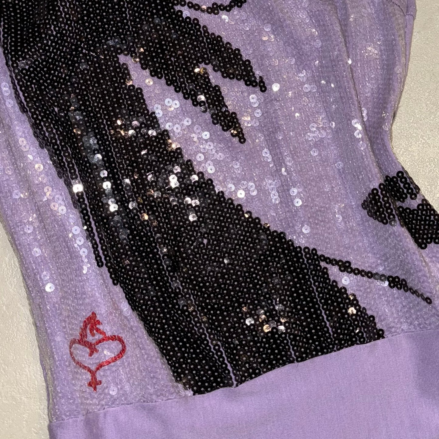 The sequined portrait side knot tank