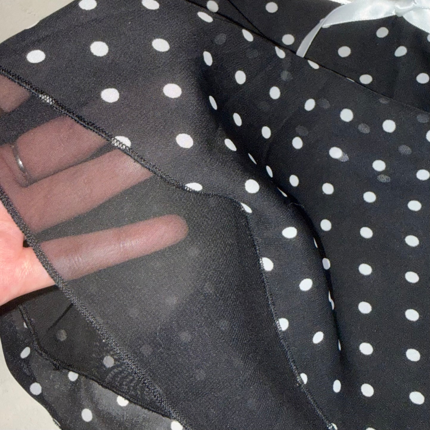 Coquette black polka dot top