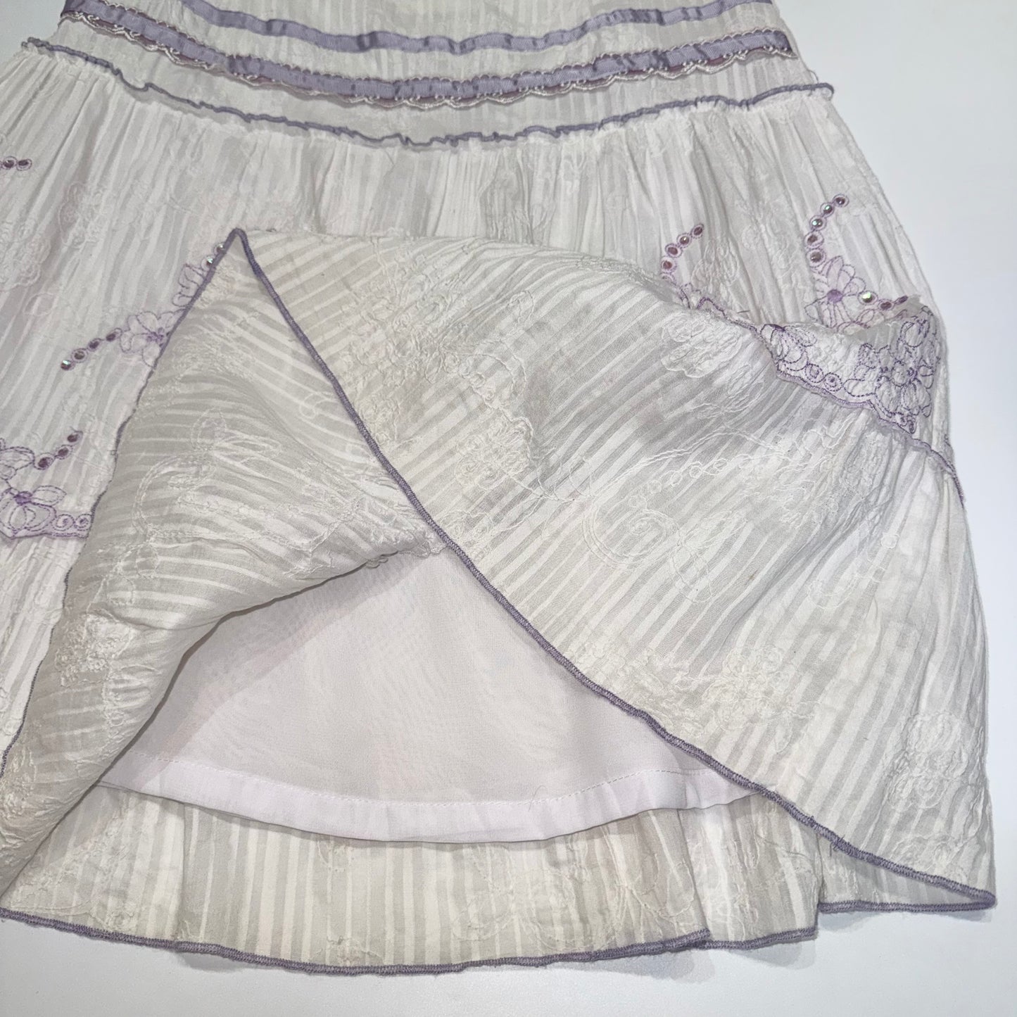 Purple embroidered white skirt