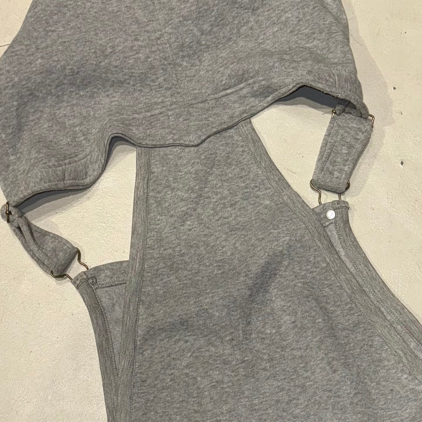 Grey hooded dress with cross graphic