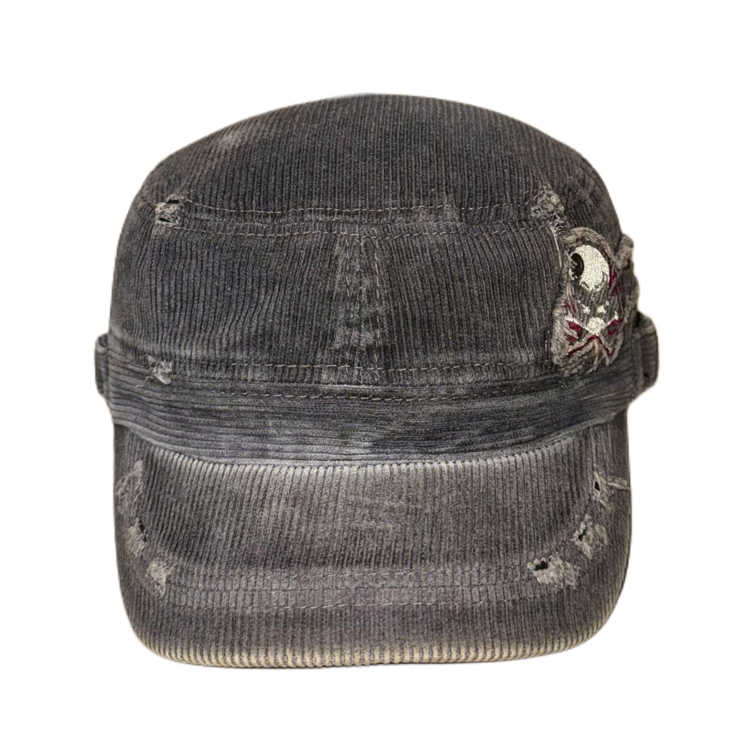 Tattered skull cap