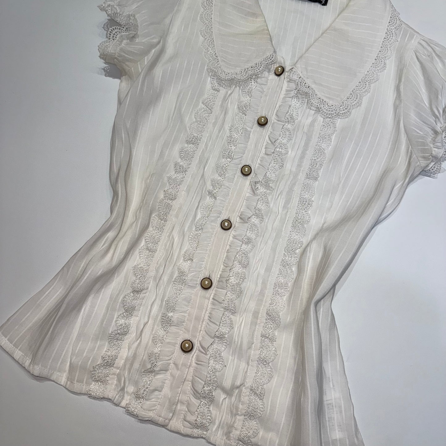 Cecil McBee white lace shirt