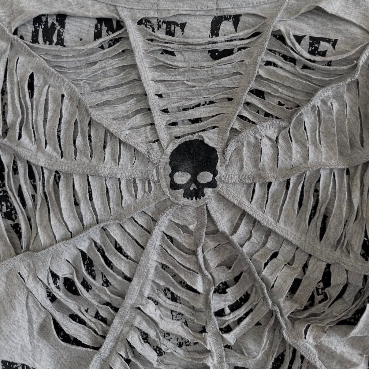 Grey skull layered top