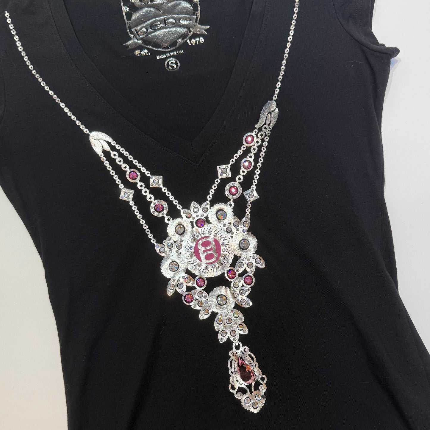 Bebe sliver pink necklace black top
