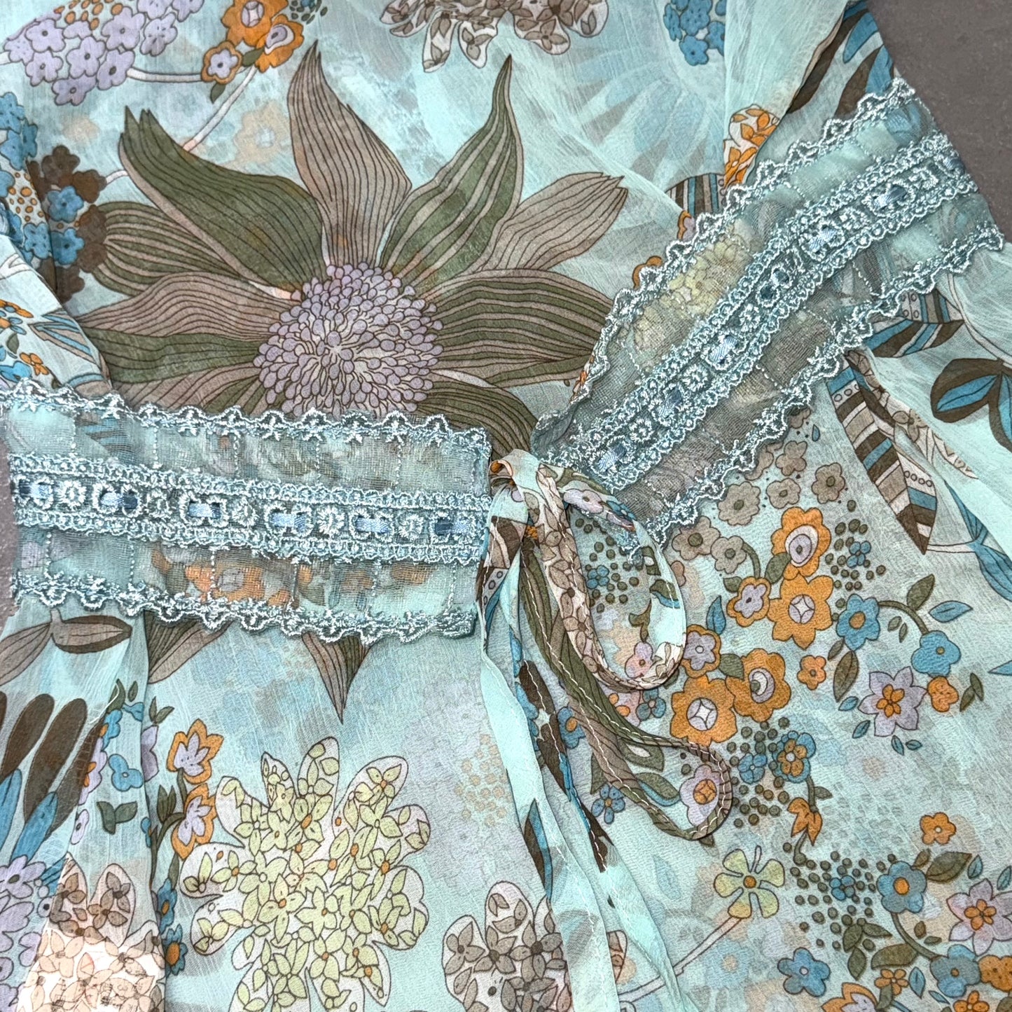 Blue floral mesh embroidered top