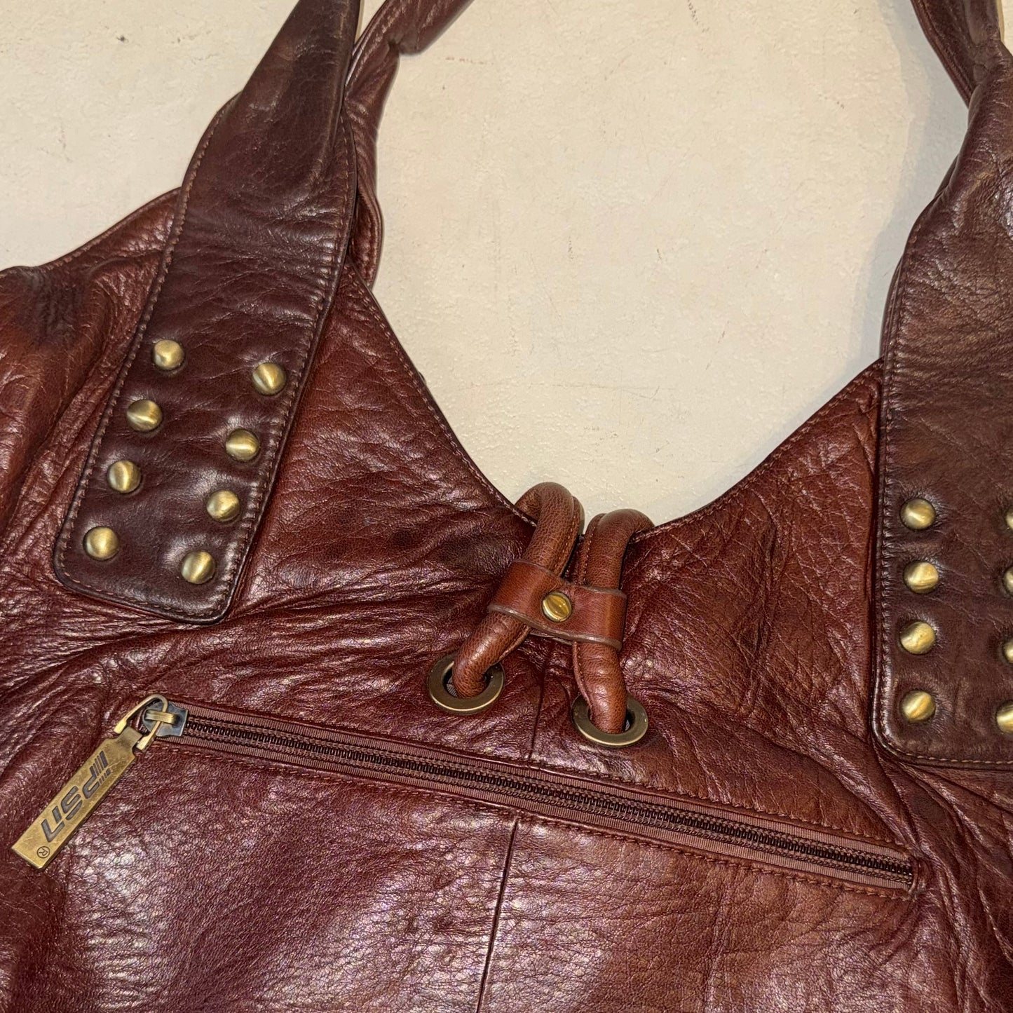 Burgundy leather studded hobo bag
