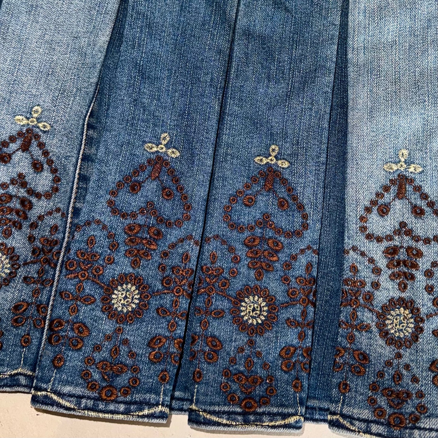 Denim embroidered pleated skirt