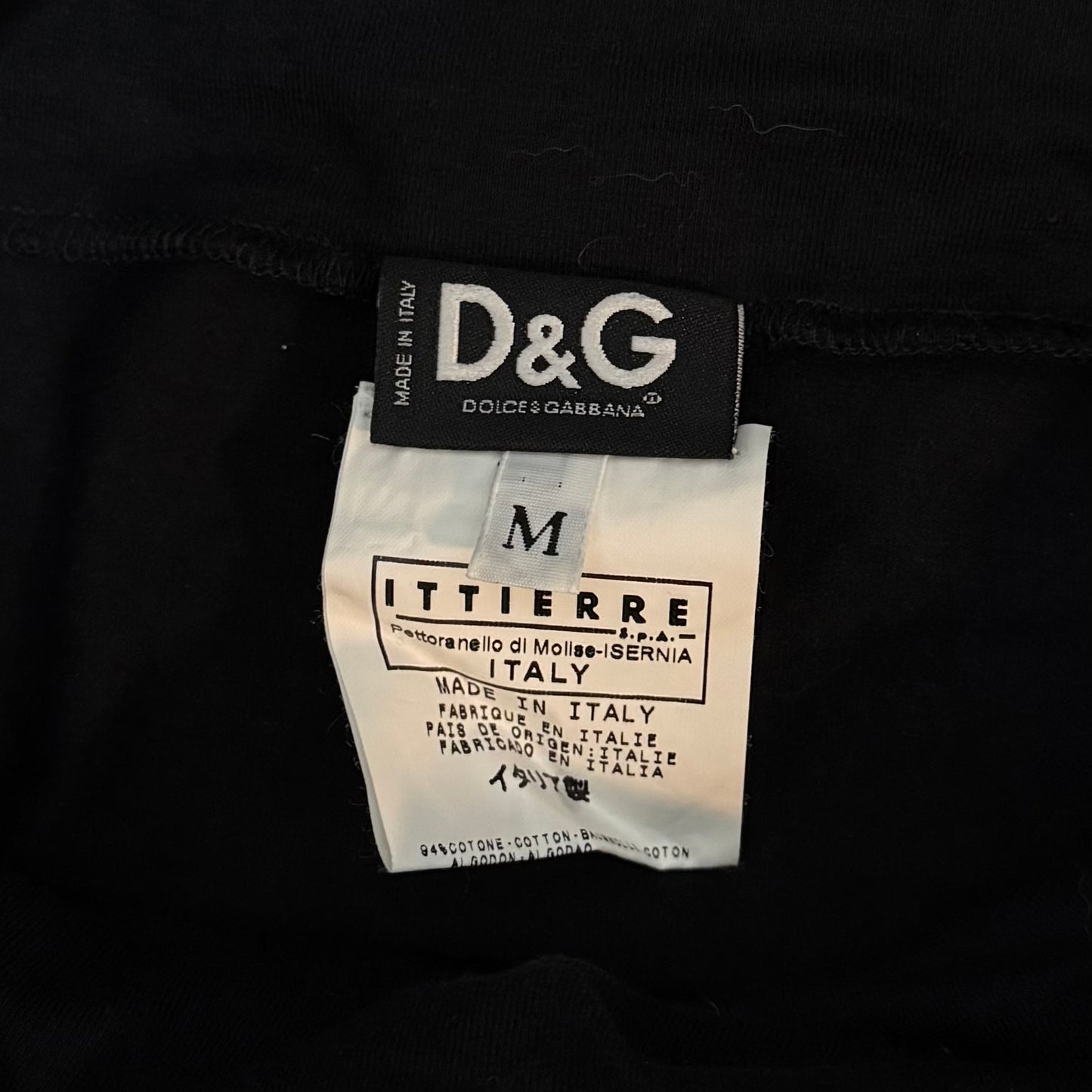 Dolce & Gabbana off-shoulder long sleeve with "I want stardom" signature golden graphic print