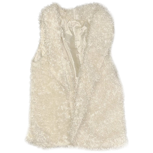 White furry vest