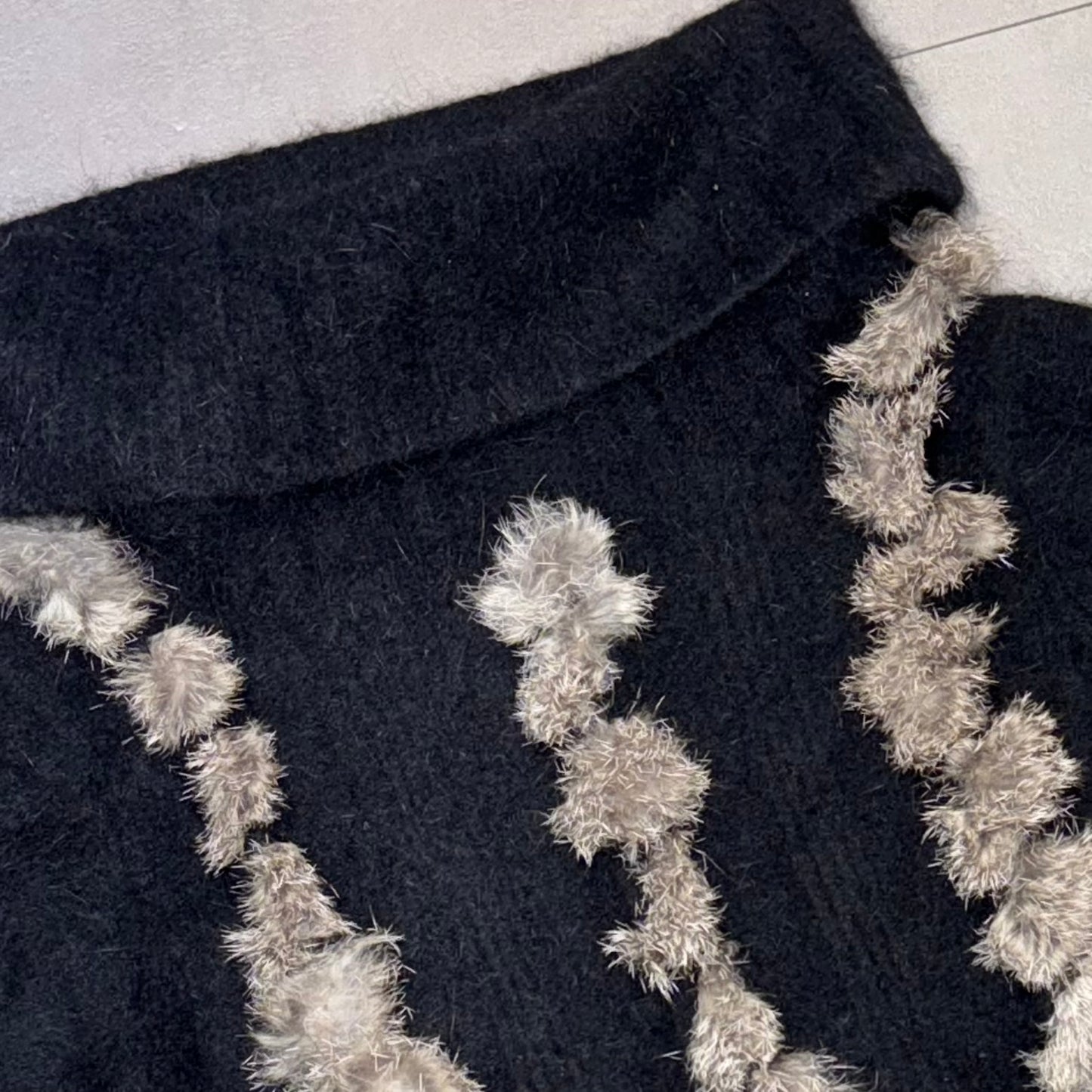Black turtle neck furry knit top