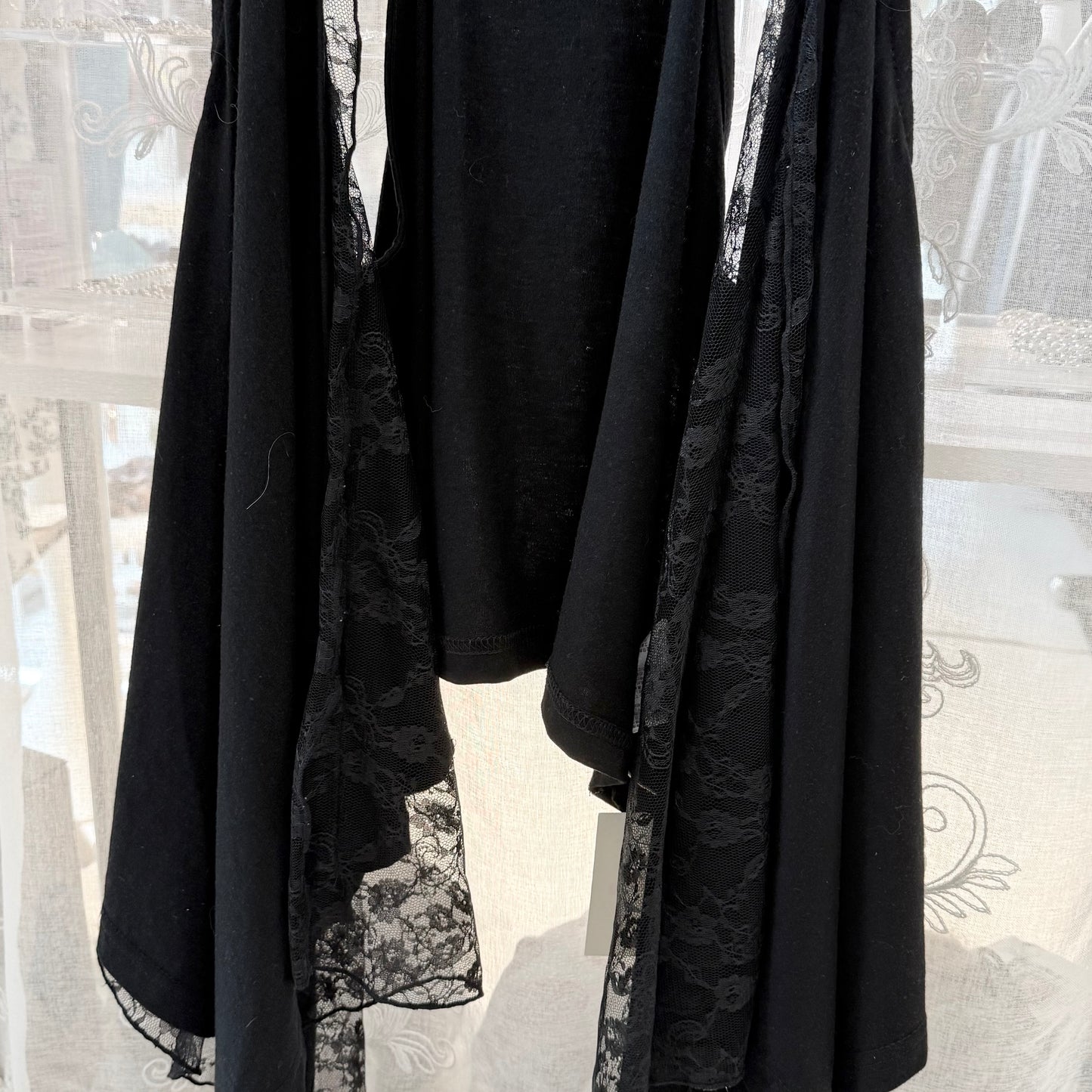 Layered asymmetrical lace vest