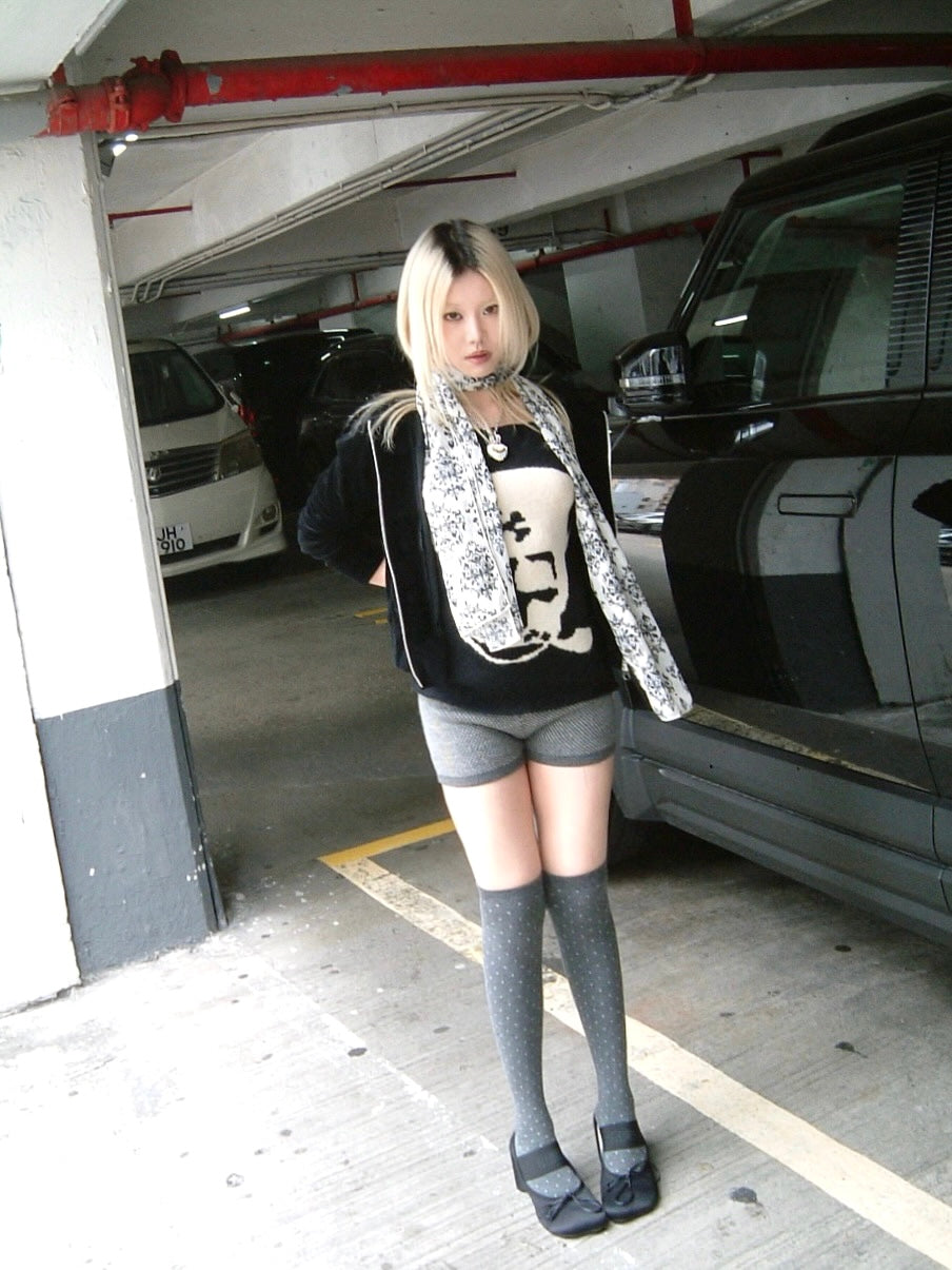 Smoking skull knit top