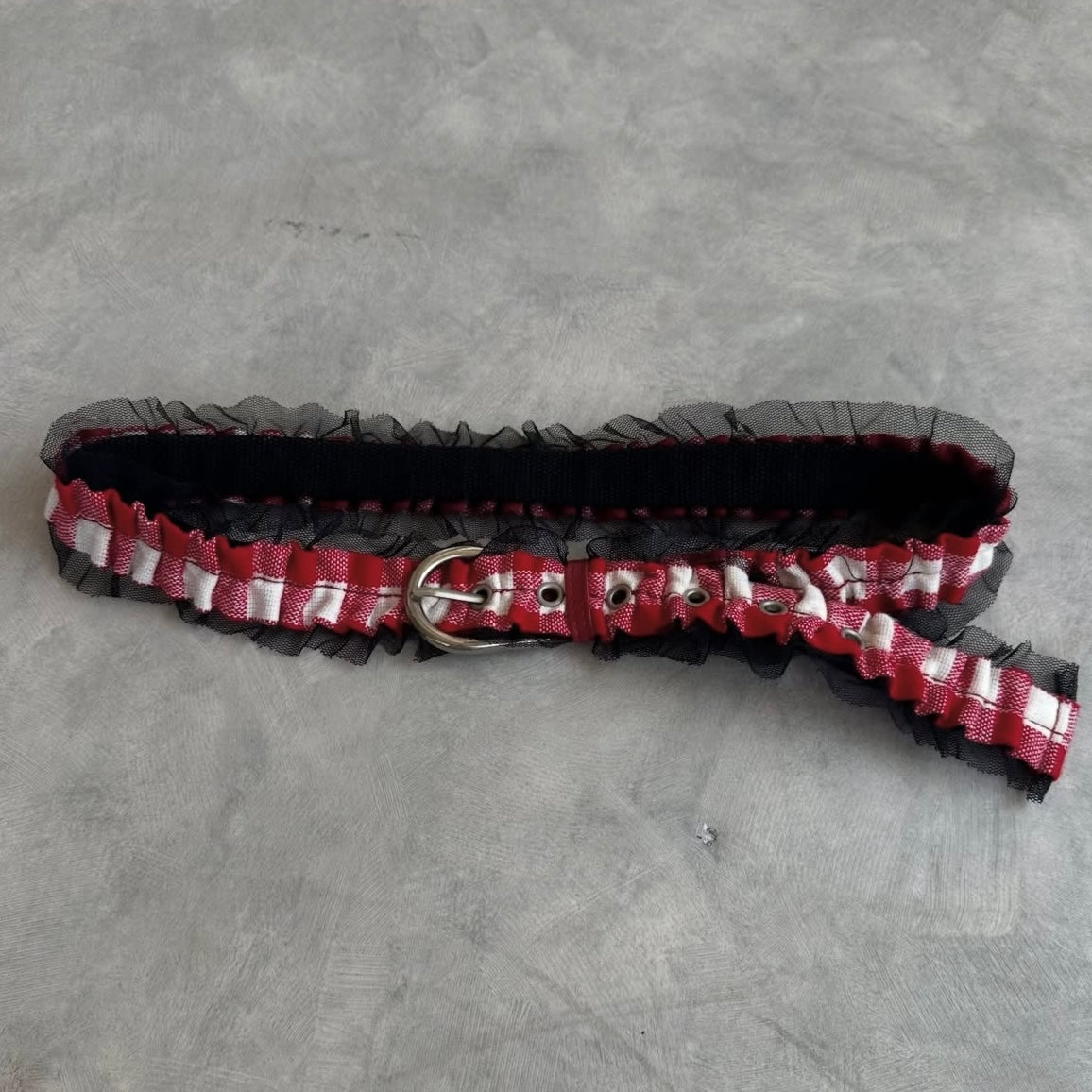 Red checkered belt