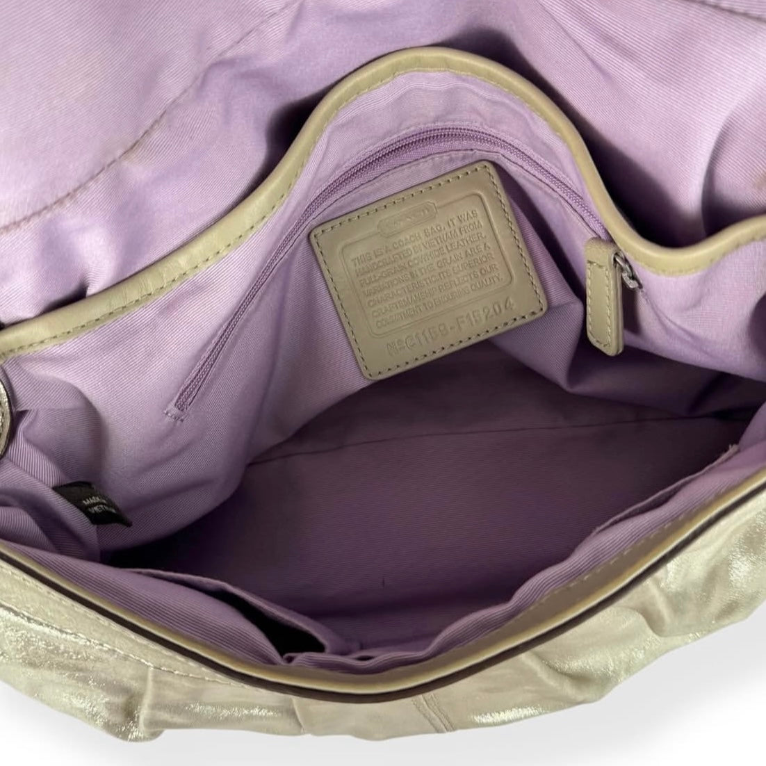 Coach metallic sliver signature soho leather bag