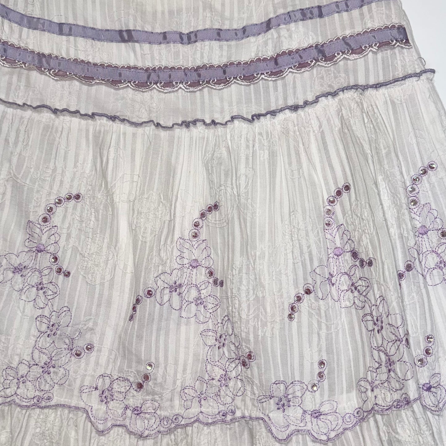 Purple embroidered white skirt