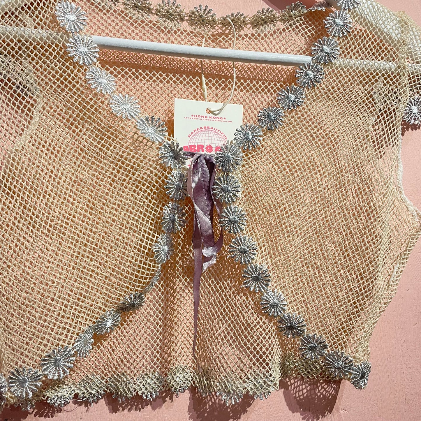 Beige Mesh outer with purple ribbon