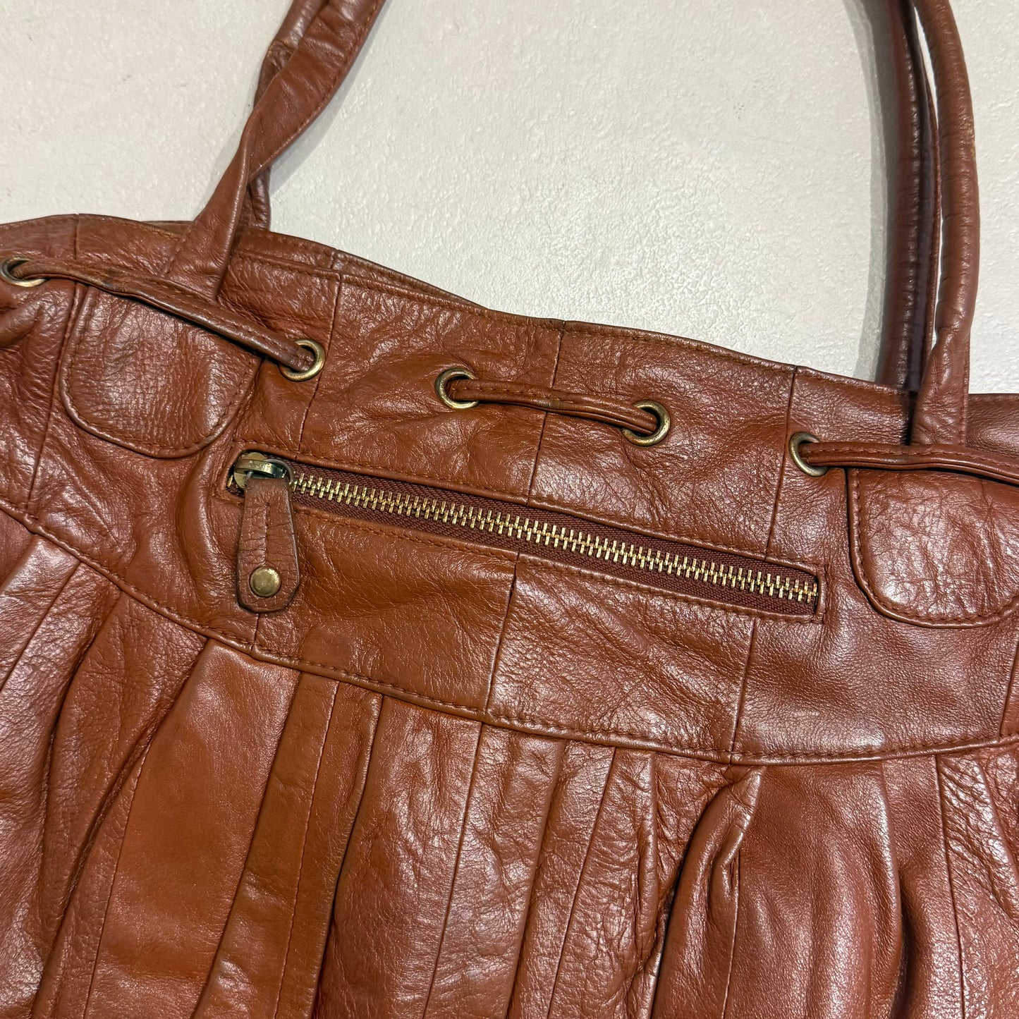 Brown rivets leather bag