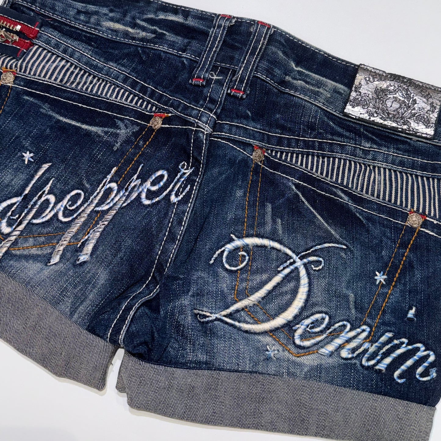Red pepper embroidered denim shorts