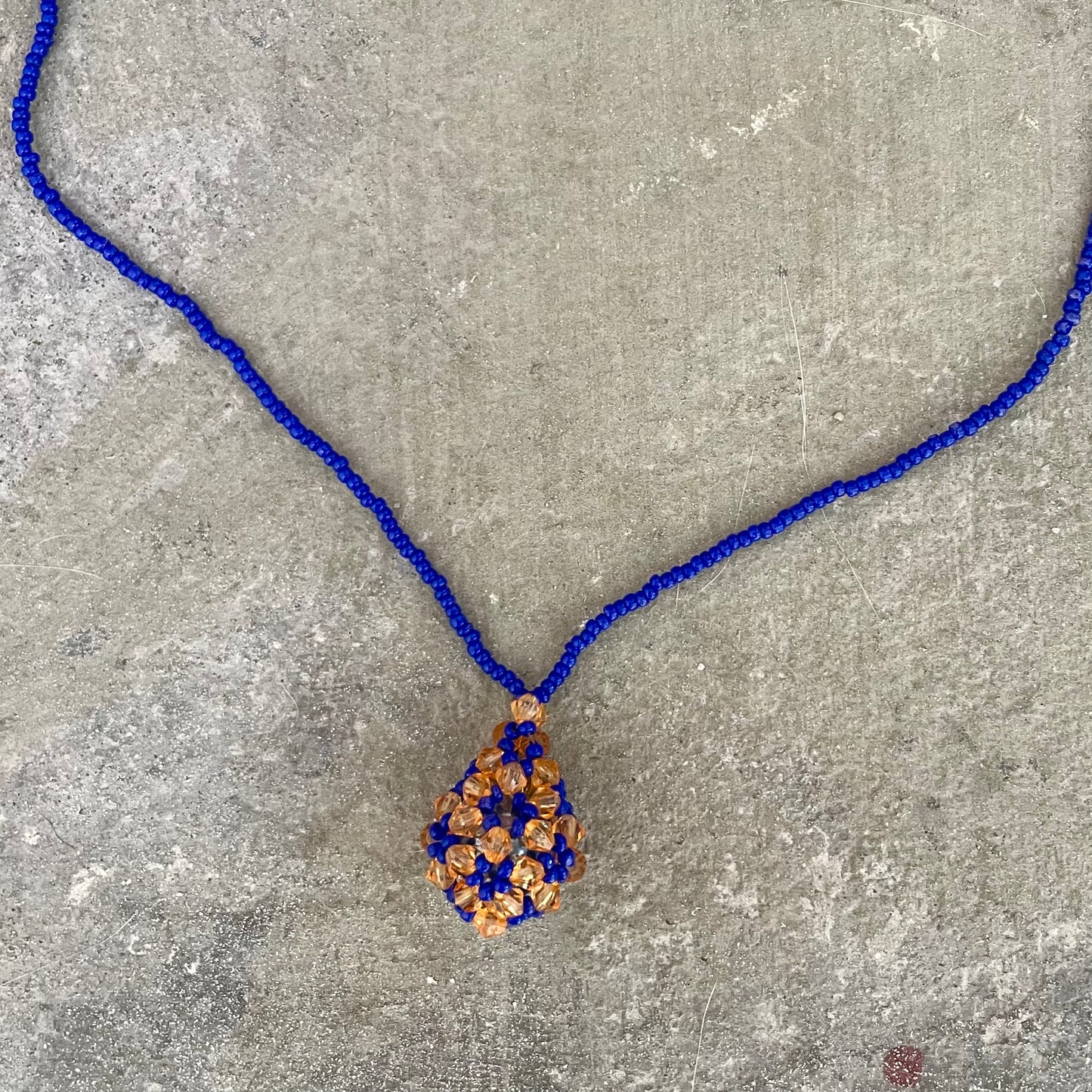 Navy orange beaded necklace