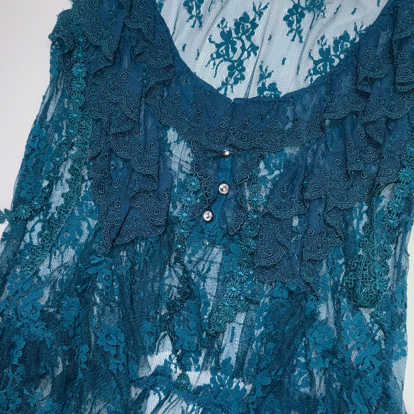 Ruffled sheer lace vest top
