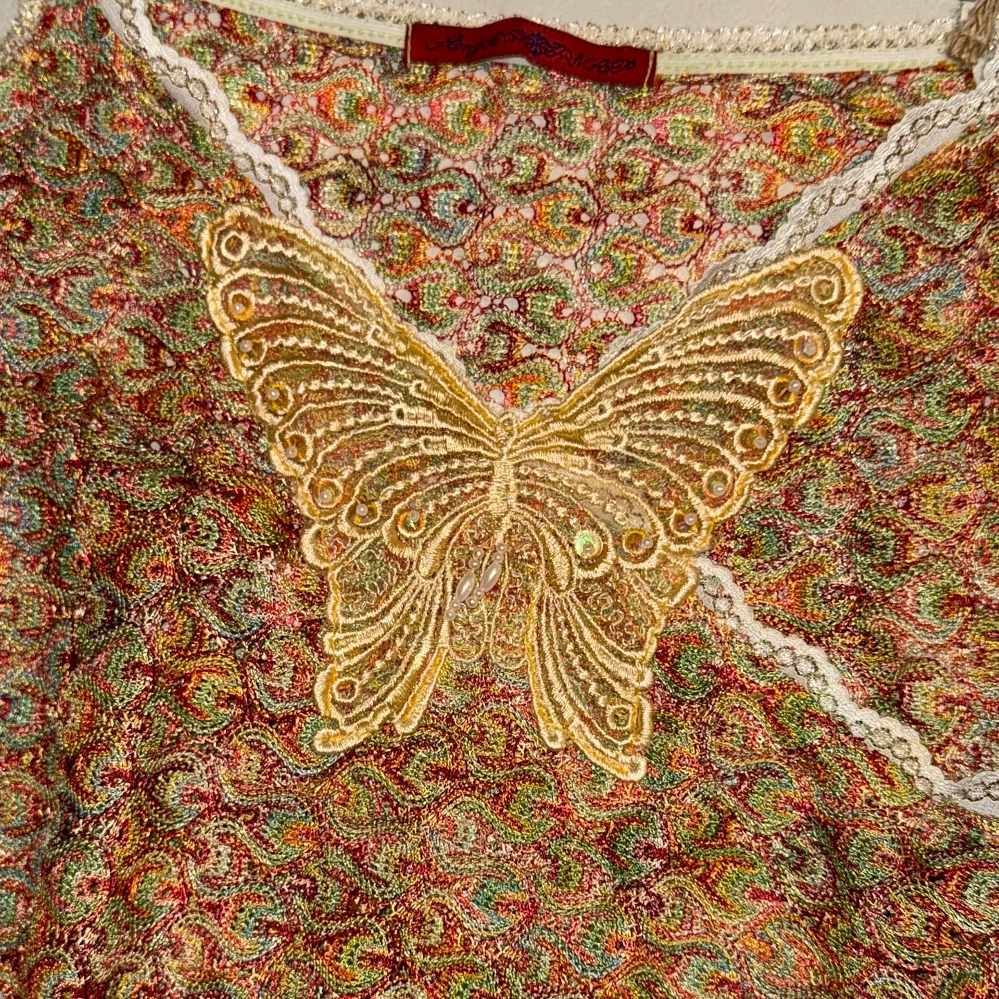 Colourful beaded butterfly knit tank