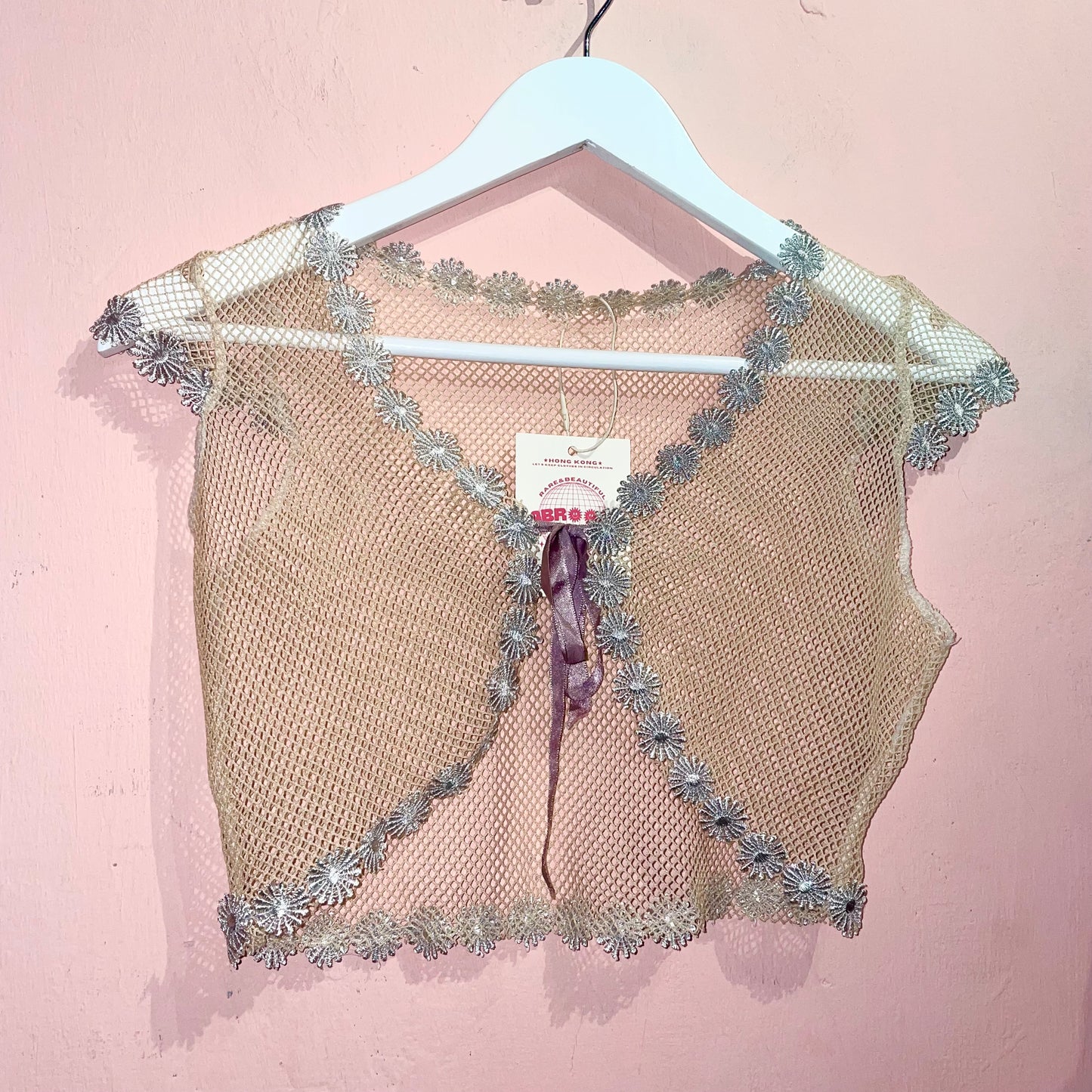 Beige Mesh outer with purple ribbon