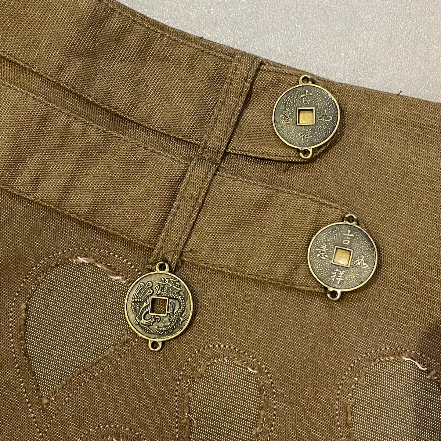 Brown skirt with coins details