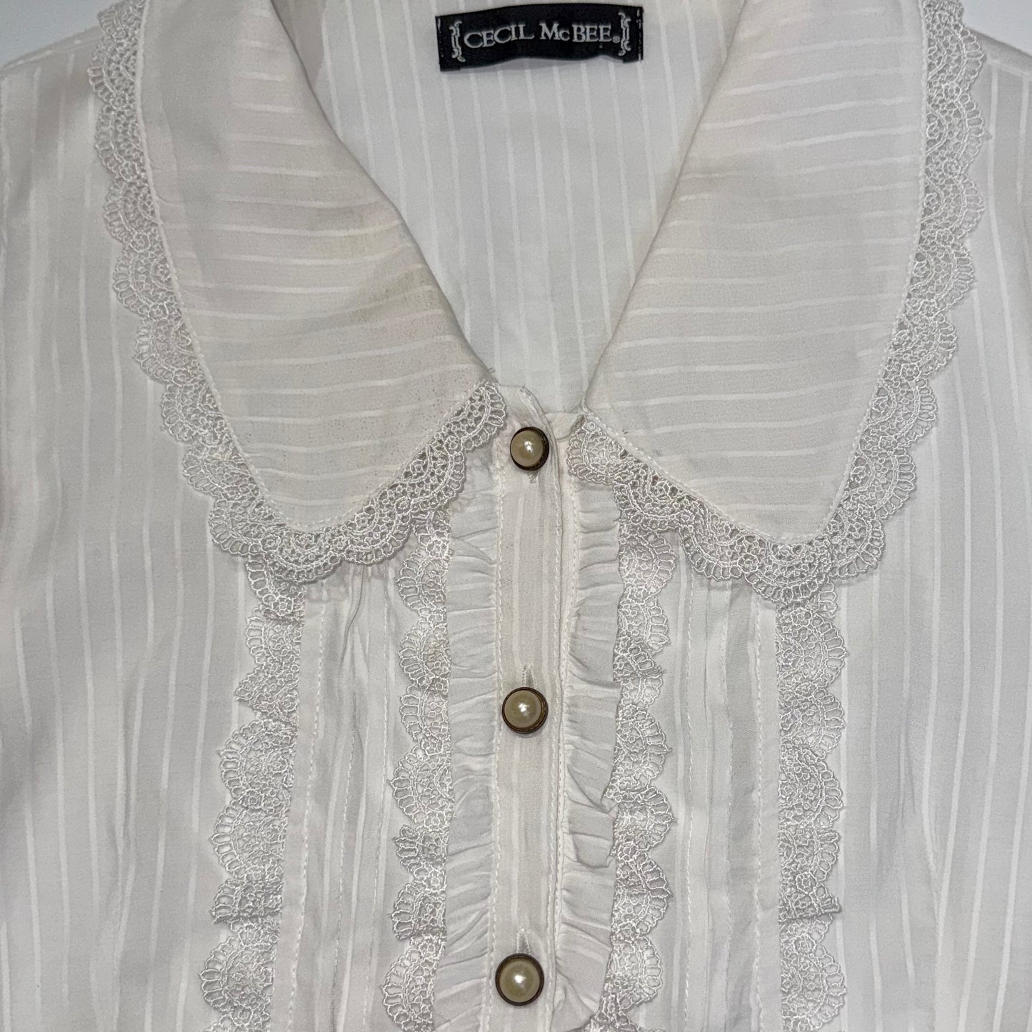 Cecil McBee white lace shirt