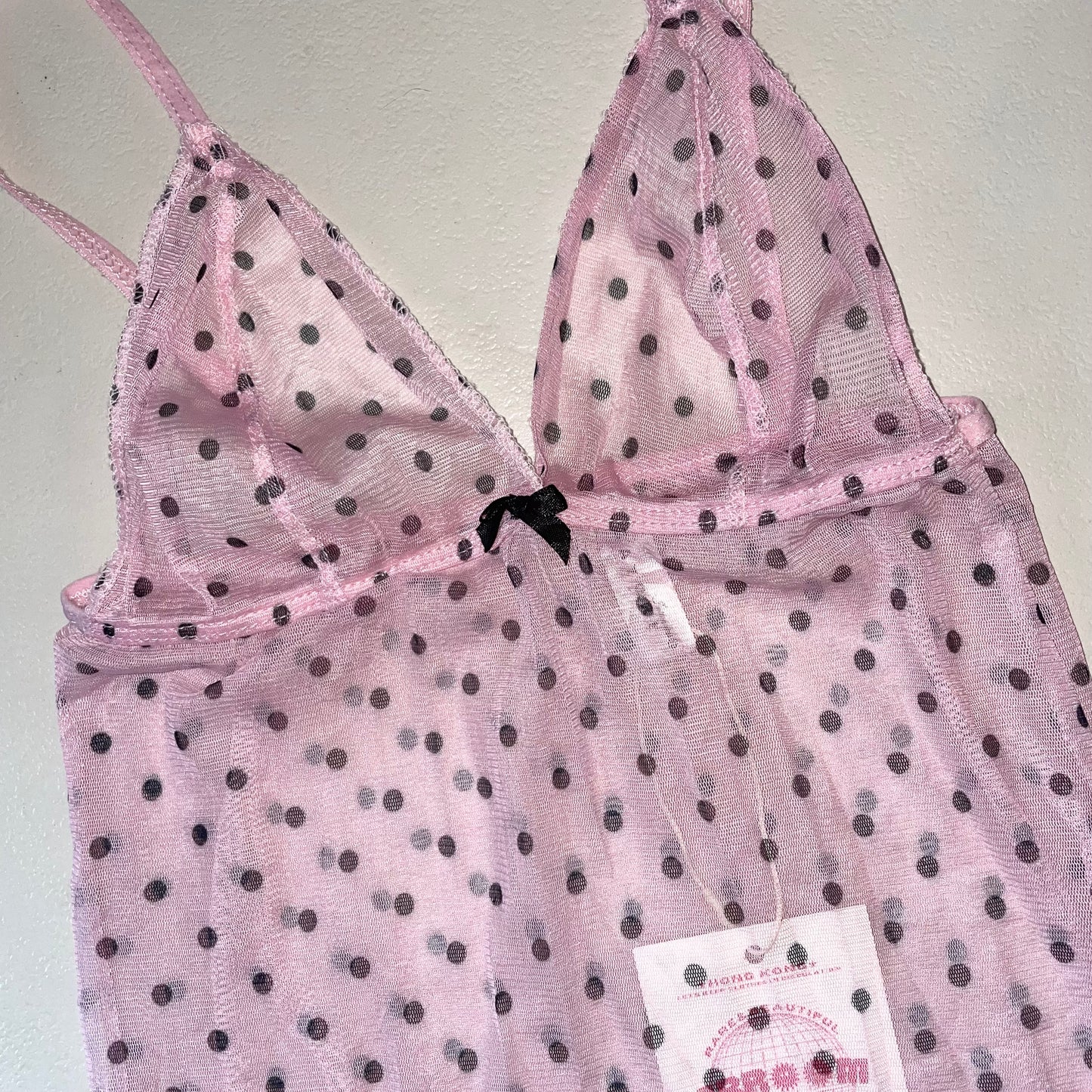 Pink mesh top with black dots