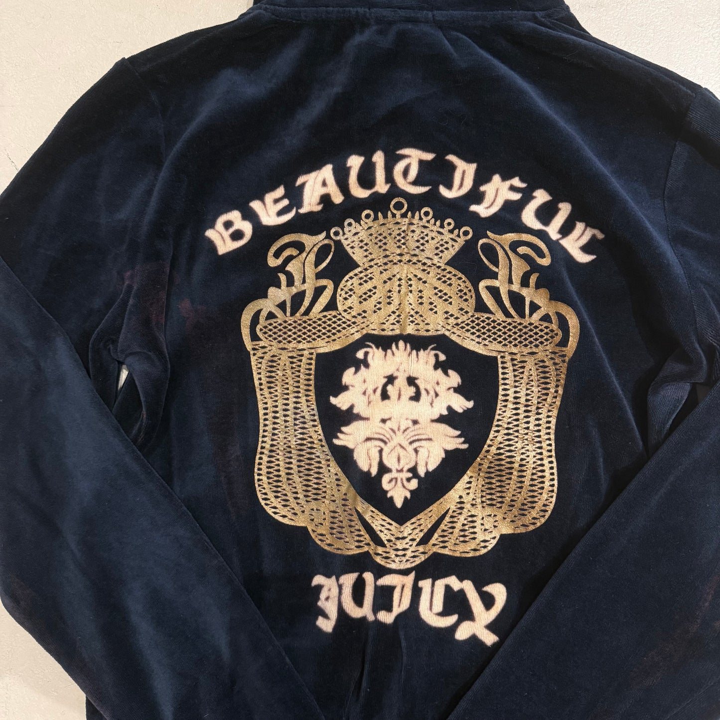 Juicy Couture Navy velvet zip up hoodie with “Beautiful Juicy” graphic
