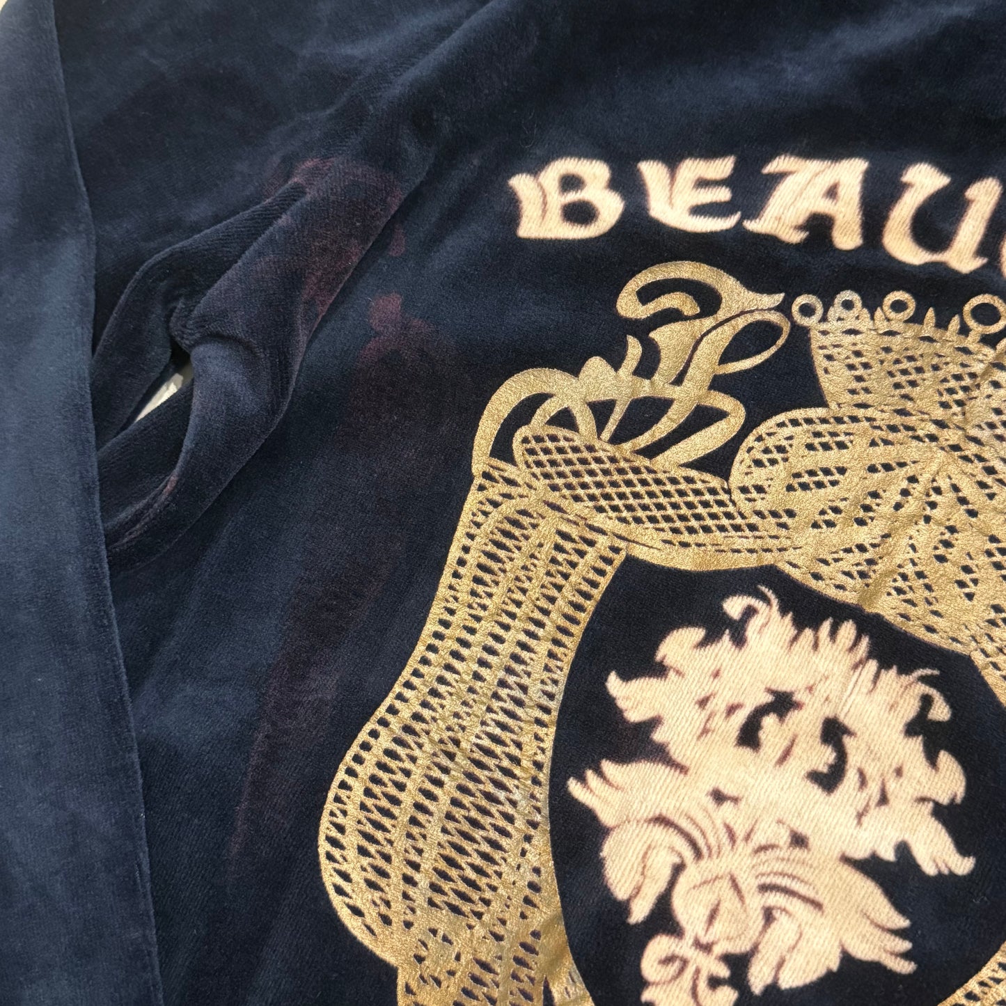 Juicy Couture Navy velvet zip up hoodie with “Beautiful Juicy” graphic