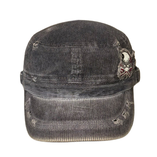 Tattered skull cap