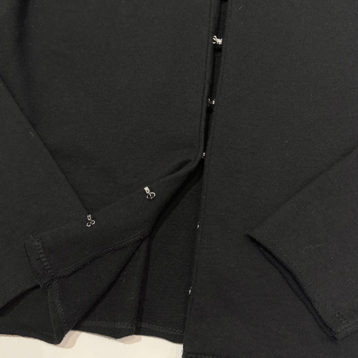 Black ruffle hook and eye outer