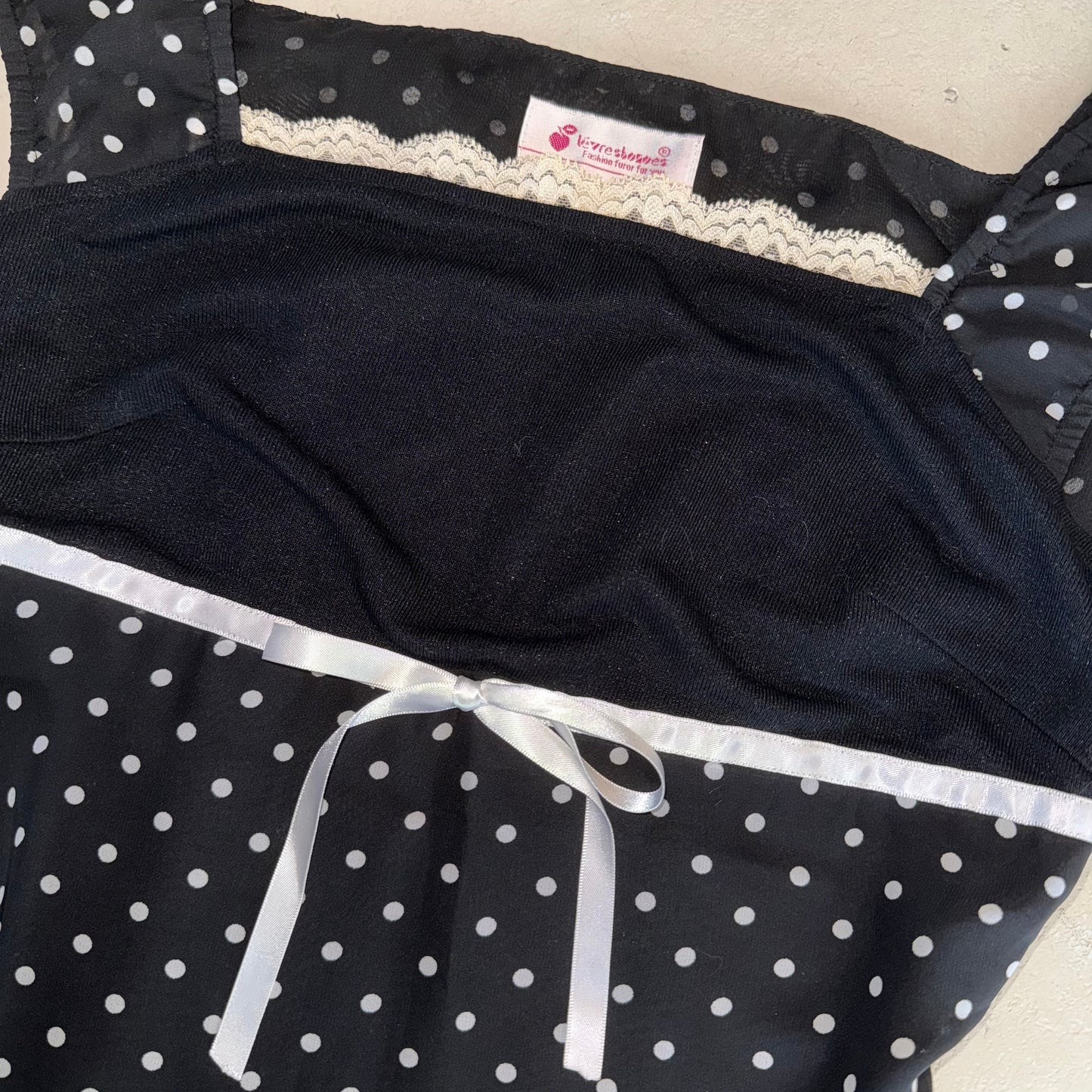 Coquette black polka dot top