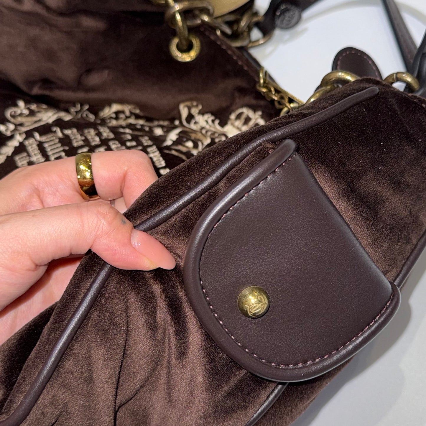 Juicy Couture brown shoulder bag with keychain