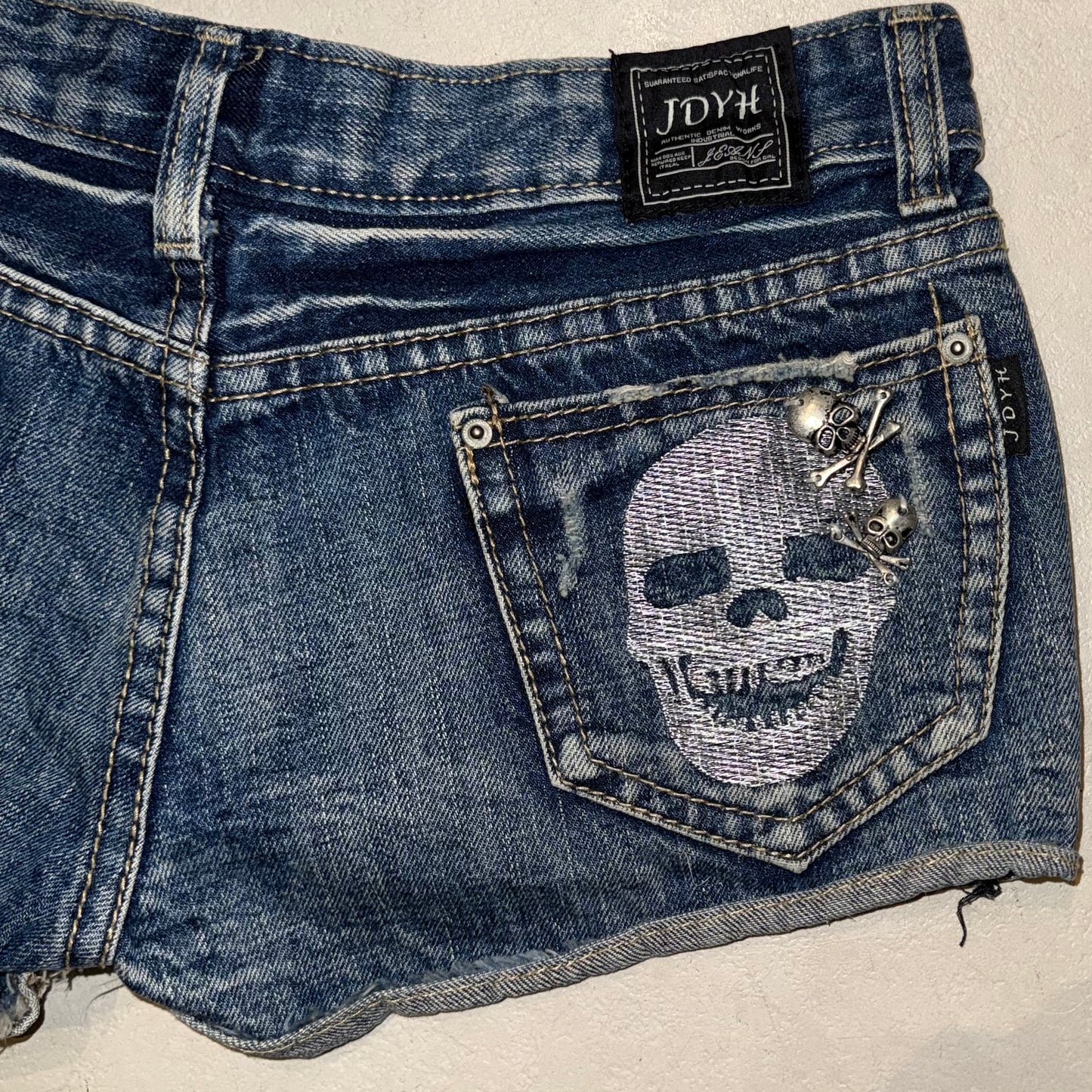 Skull denim shorts