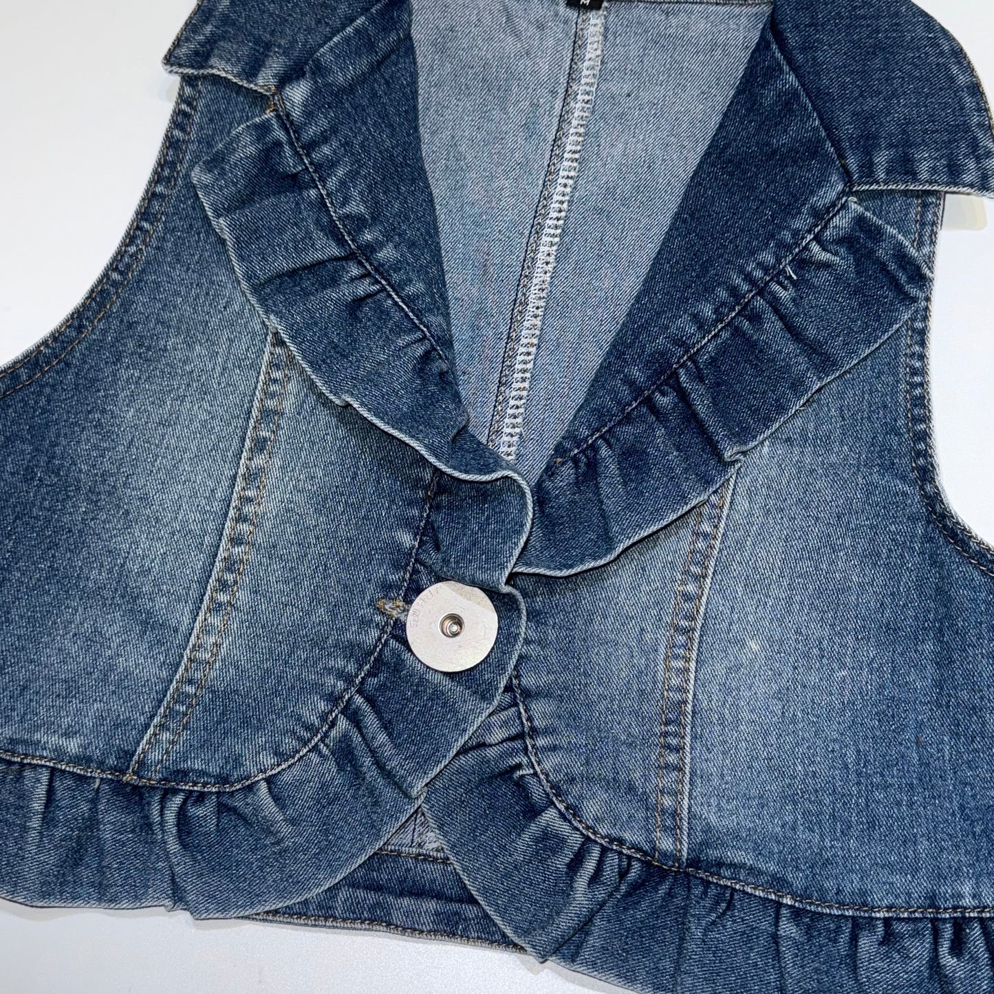 Denim ruffle cropped vest