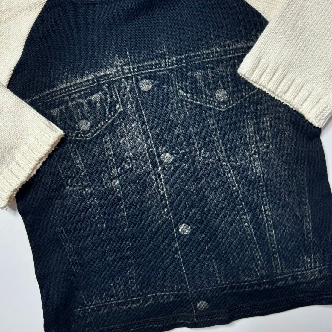 Denim top with white knit sleeves