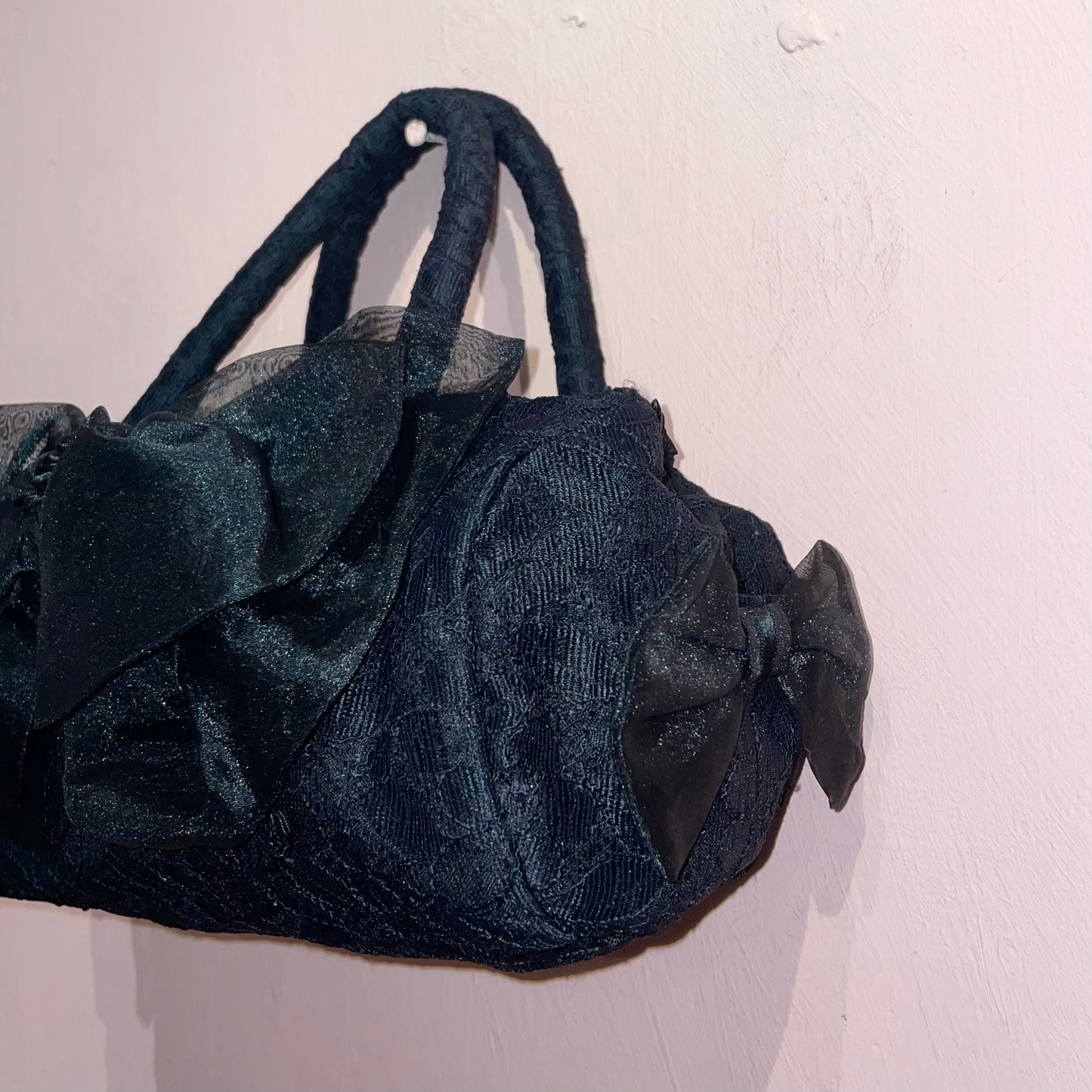 Black lace ribbon bag